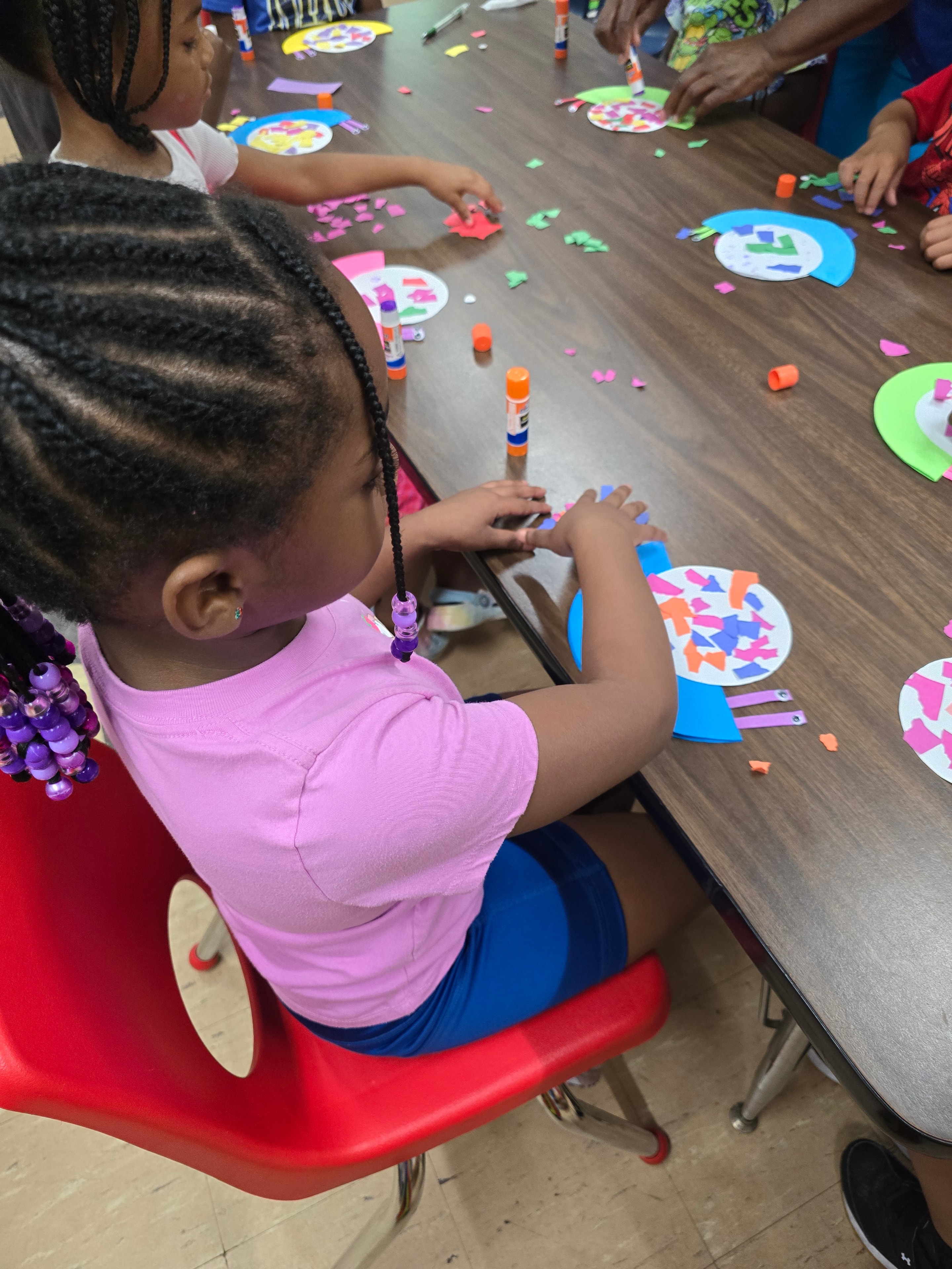 Teacher and children building with blocks